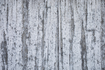 grey concrete stone wall looks like paper, urban and aged cement wall for a background,
space for text, horizontal and no person