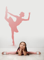 Obraz na płótnie Canvas Cute little girl dreaming to be ballet dancer. Silhouette of woman behind kid's back