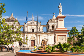 Leon, Nicaragua - November 27, 2008: Combination of statue of Maximo Jerez on beige-maroon pedestal...