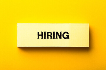 Hiring Business Concept On Yellow Background