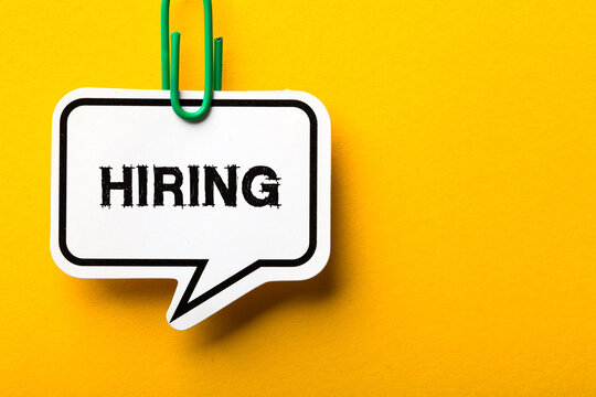Hiring Business Concept On Yellow Background