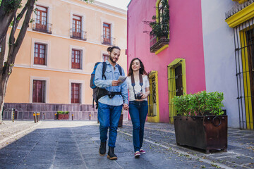 Fototapeta na wymiar latin young couple tourists in Mexico Latin America 