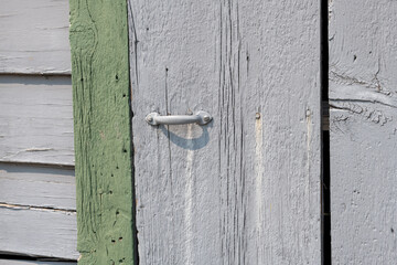 old wooden door with metal handle