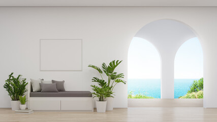 Sofa near blank picture frame on white wall of living room in modern house or luxury hotel. Cozy home interior 3d rendering with beach and sea view.