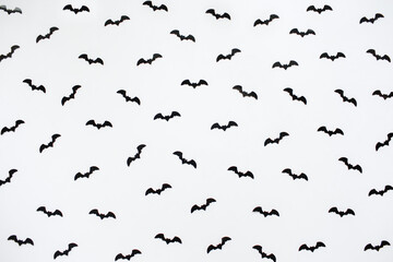 Halloween decorations with bats on gray background. Halloween concept. Flat lay, top view