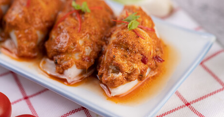 Chu che squid with spring onion, tomato, lemon and chili.