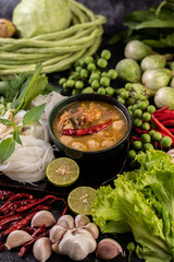 Rice noodle and coconut milk solution.