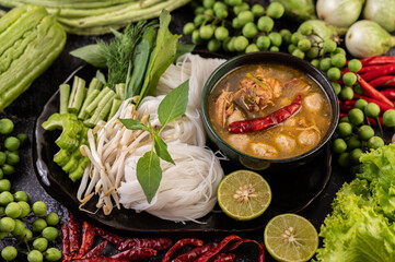 Rice noodle and coconut milk solution.