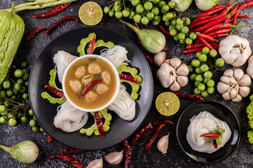 Rice noodle and coconut milk solution.