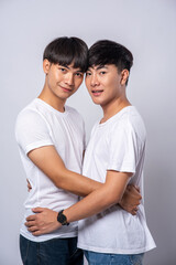 Fototapeta premium Two men who love each other happily hug each other.