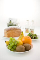 various fresh fruits and bread