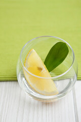 slice of lemon in glass