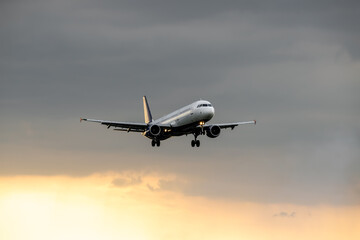 Fototapeta na wymiar Passenger plane on sunset