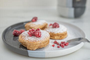 sweet home made vanilla pancakes with raspberries
