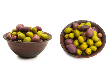 Olives in ceramic brown bowl isolated on white