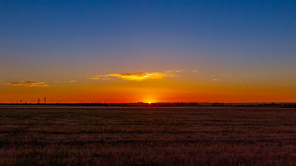 Beautiful sunset in autumn in the fields
