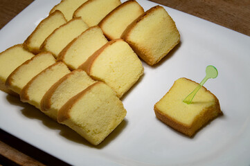 lot of soft sponge cake in white dish for party