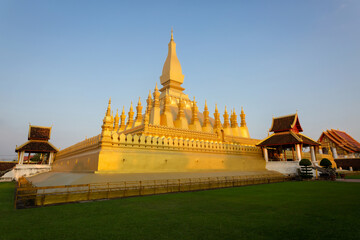 Pha That Luang is a gold-covered large Buddhist stupa in the center of the city of Vientiane, Laos. Pha That Luang Temple