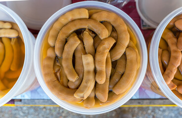 Preserved Tamarind in syrup. Tamarind pickled fermented, Pickled fruits or preserved sweet fruits. Pickled tamarind, preserved sweet tamarind fruit.