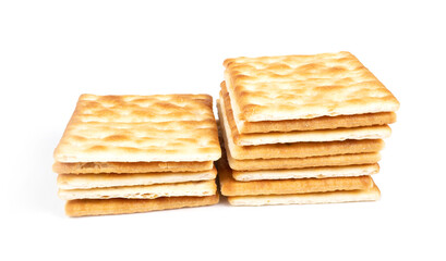 Stack of square crackers isolated on white background.