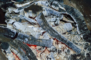 close-up - smoldering charcoal, charred, prepared for barbecue