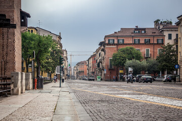 Fototapeta na wymiar Old Castle street (Corso Castelvecchio) in Verona, Italy