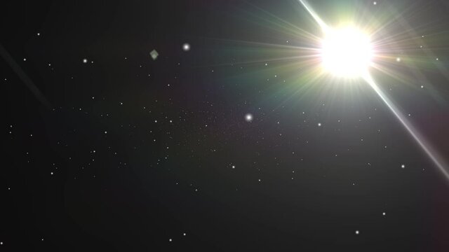 the bright light emanating from a star in the dark space of the universe