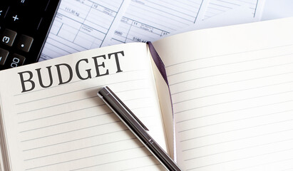 Notebook with Toolls and Notes about BUDGET