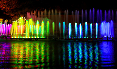 Multicolored fountain at night