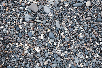 Stone pebbles by the sea.