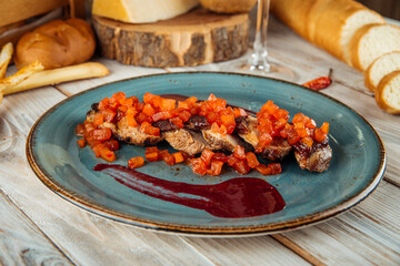 Gourmet chicken roll with pepper saute and sauce