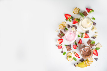 Fototapeta na wymiar Set of colorful milkshakes or smoothies