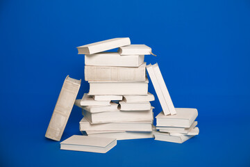 stack of books on background