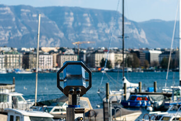 Tourist binoculars on the shores of Lake Geneva, Geneva, Switzerland