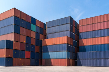 Colourful stack pattern of cargo shipping containers in shipping yard,dock yard for transportation,import,export industrial concept