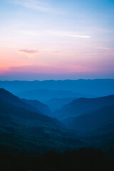 Fototapeta na wymiar Twilight color mountain The mountain valley after the twilight light sunset