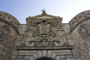 Fototapeta na wymiar Coat of arms of Gate Puerta de Bisagra in Toledo, Spain