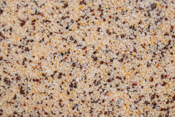 textural plaster of the house wall, colored granite chips, background