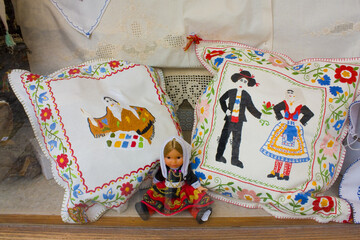 Souvenir pillows with embroidery for sale in Toledo, Spain