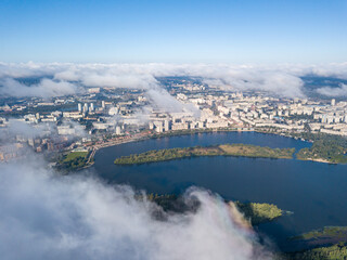 Obraz premium Flying over autumn clouds in Kiev. Sunny morning.