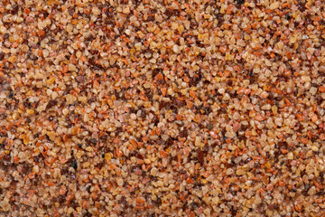 textural plaster of the house wall, colored granite chips, background