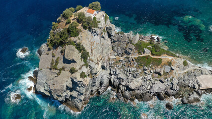 Aerial drone photo of picturesque chapel of Saint John built in famous cliff where Mamma Mia movie was filmed, Skopelos island, Sporades, Greece