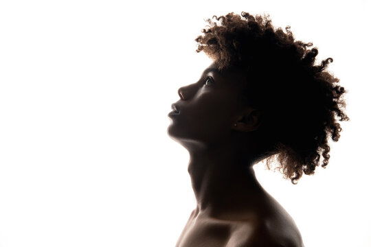 Black man silhouette. Masculine power. Profile portrait of confident african guy looking up isolated on white copy space. Ethnic problems. Independence freedom. Human tolerance