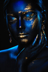 Portrait of a beautiful girl with an exquisite fantasy makeup in the style of legends about ancient greece and pharaohs - obrazy, fototapety, plakaty
