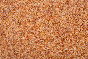 textural plaster of the house wall, colored granite chips, background