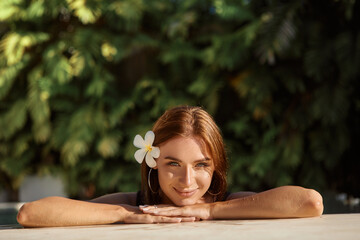 Summer. Beautiful Sexy Young Woman, Girl With Healthy Skin In Bikini Relaxing In Swimming Pool Water In Resort Relax Spa Hotel. Holidays Vacation. Body Health Care, Beauty Concept. Lifestyle, Wellness