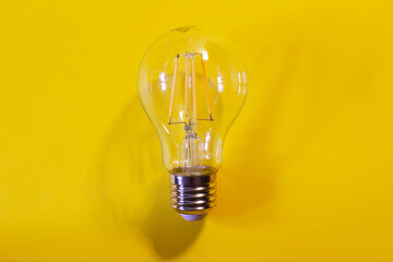 electric bulb on yellow background