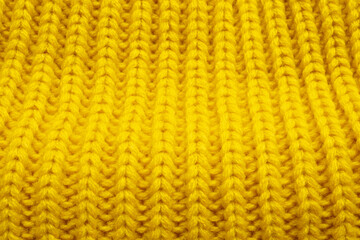 Yellow knitting wool texture background