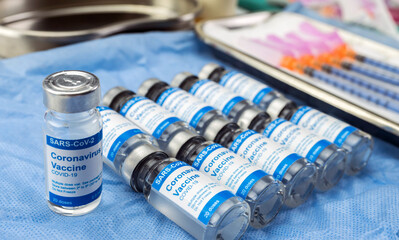 Coronavirus covid-19 experimental vaccine in a laboratory, conceptual image