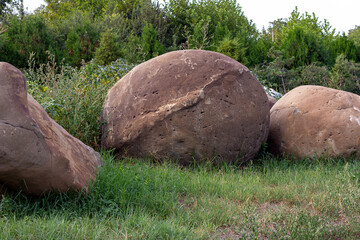 Natural rock garden in a wild nature Park in the open air on a summer day.
